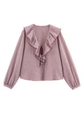 SARA - Blusa a cuadros con volantes
